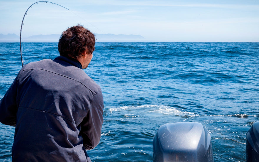 Person deep sea fishing